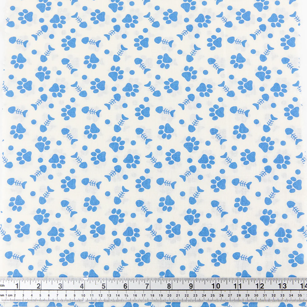 Print Craft & Quilting Fabric, Paw Prints And Fish Bones On Cream- Width 110cm