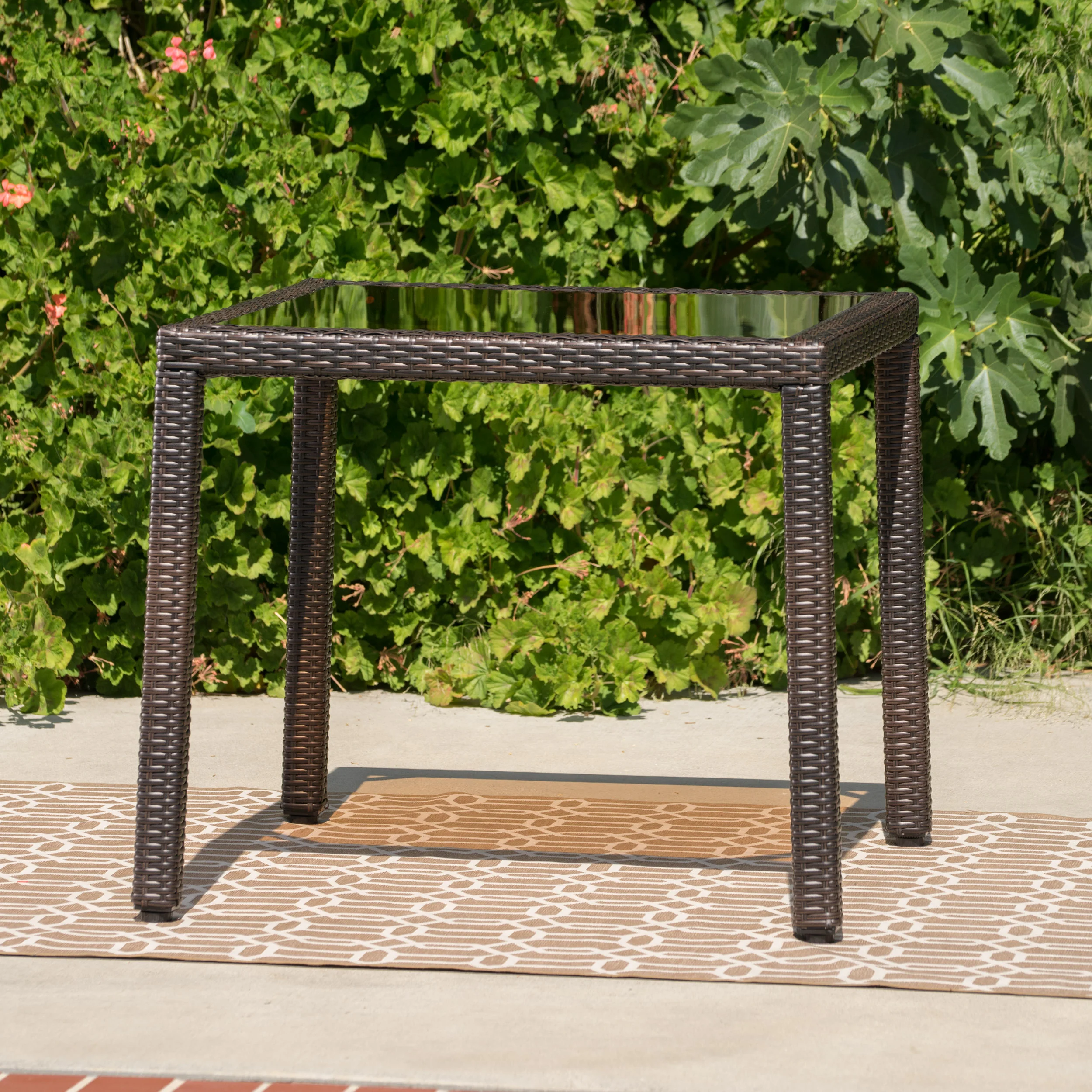 San Tropez Outdoor Wicker Dining Table with Tempered Glass Top - furnishings