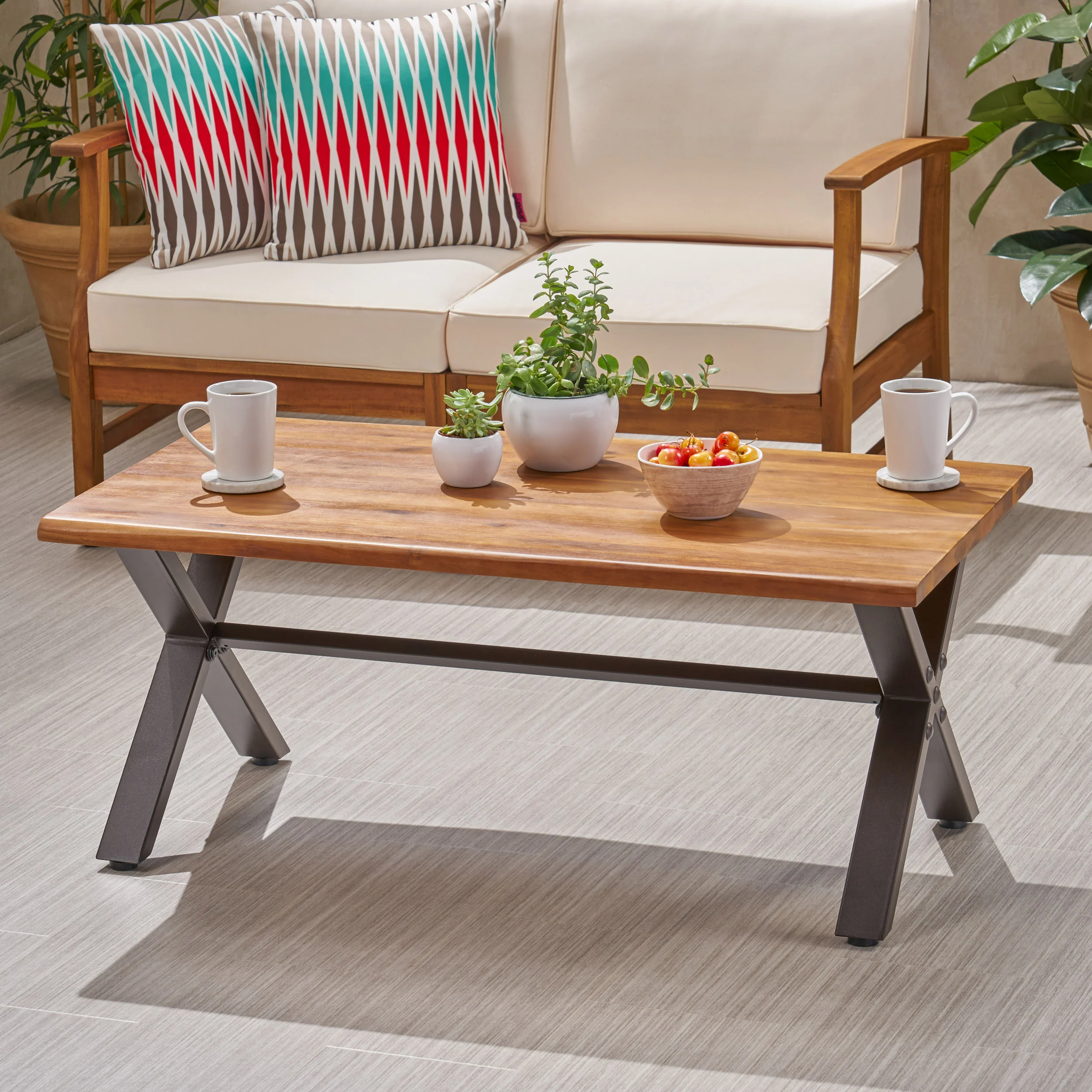 Ishtar Outdoor Farmhouse Teak Acacia Wood Coffee Table with Black X-Frame Legs - furnishings