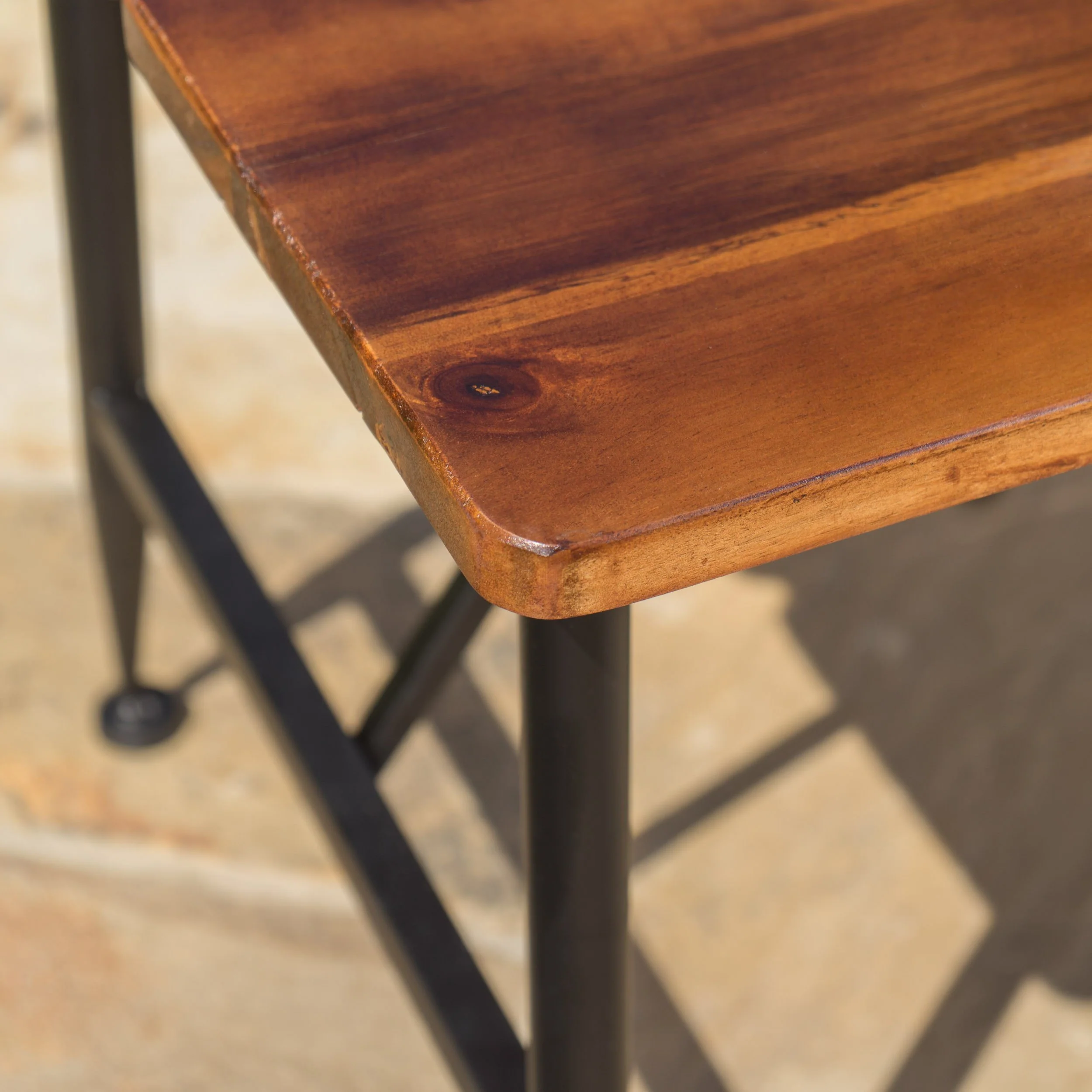 Ellaria Indoor/Outdoor Industrial Acacia Wood Coffee Table, Antique Teak and Black - furnishings