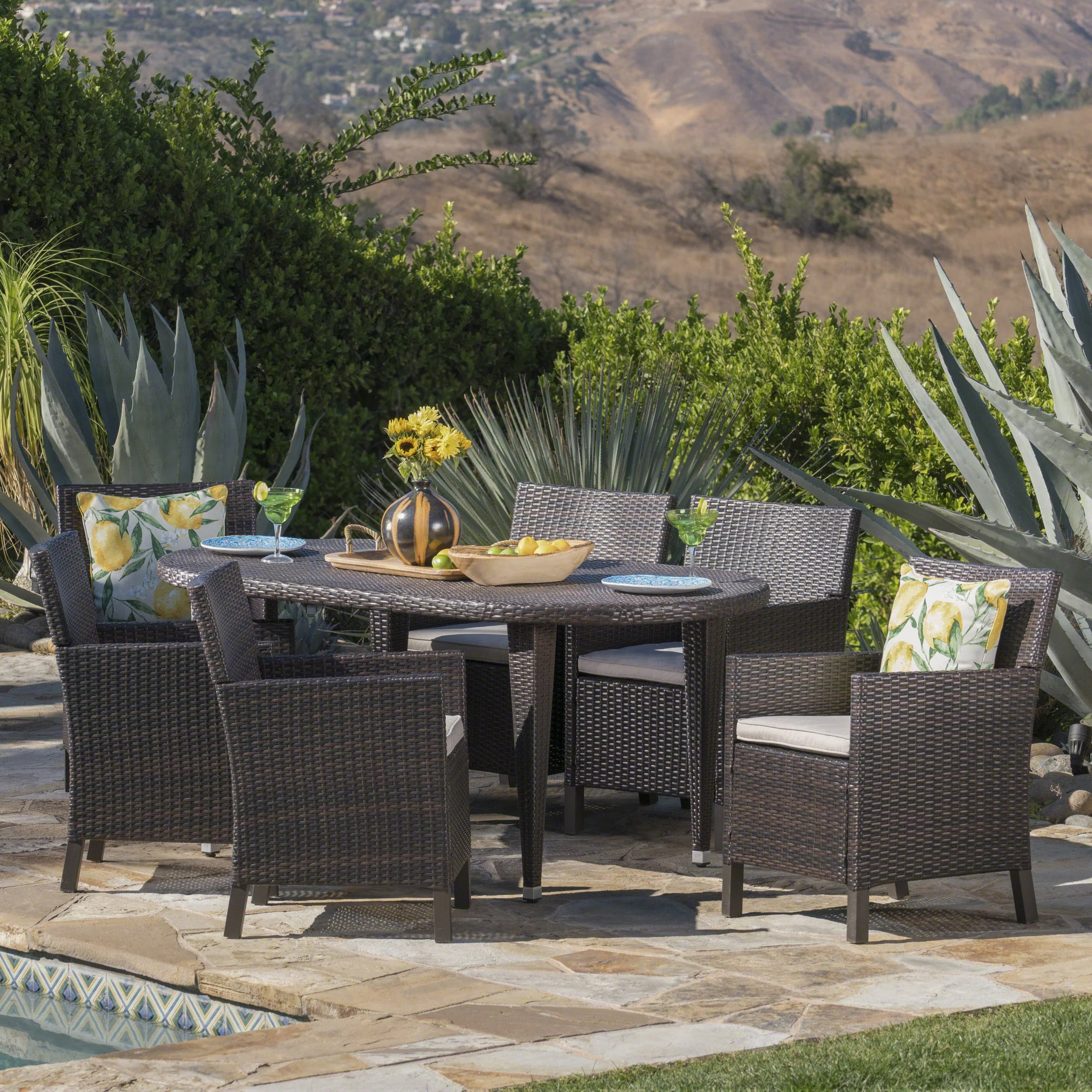 Crete Outdoor 7 Piece Wicker Oval Dining Set with Water Resistant Cushions - furnishings