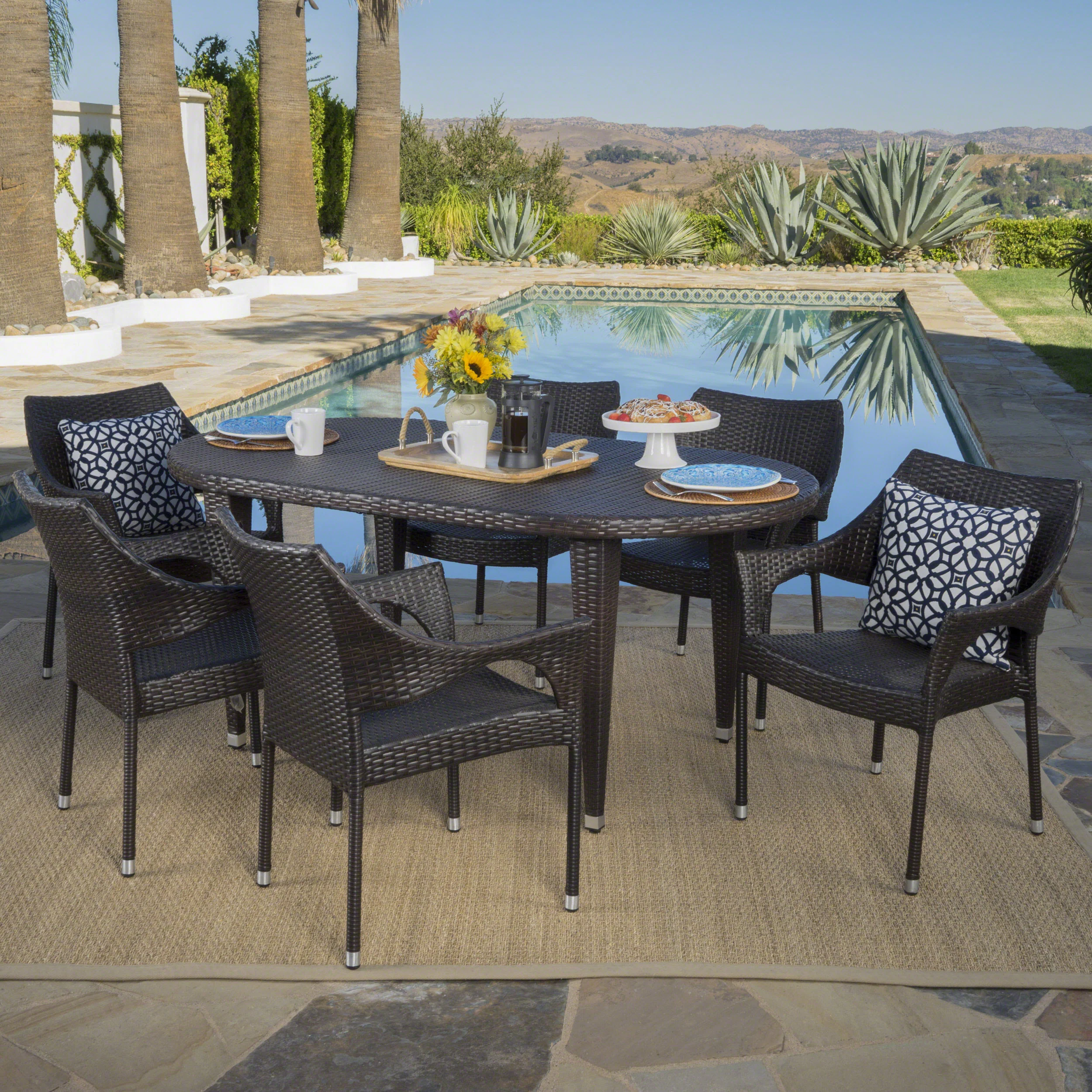 Tannis Outdoor 7 Piece Multi-brown Wicker Oval Dining Set with Stacking Chairs - furnishings