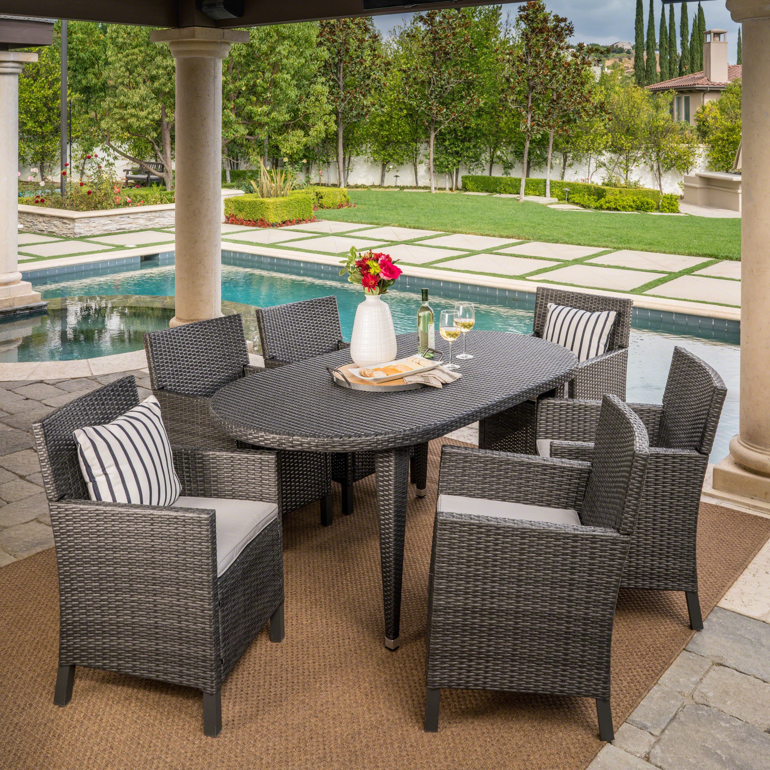 Crete Outdoor 7 Piece Wicker Oval Dining Set with Water Resistant Cushions - furnishings