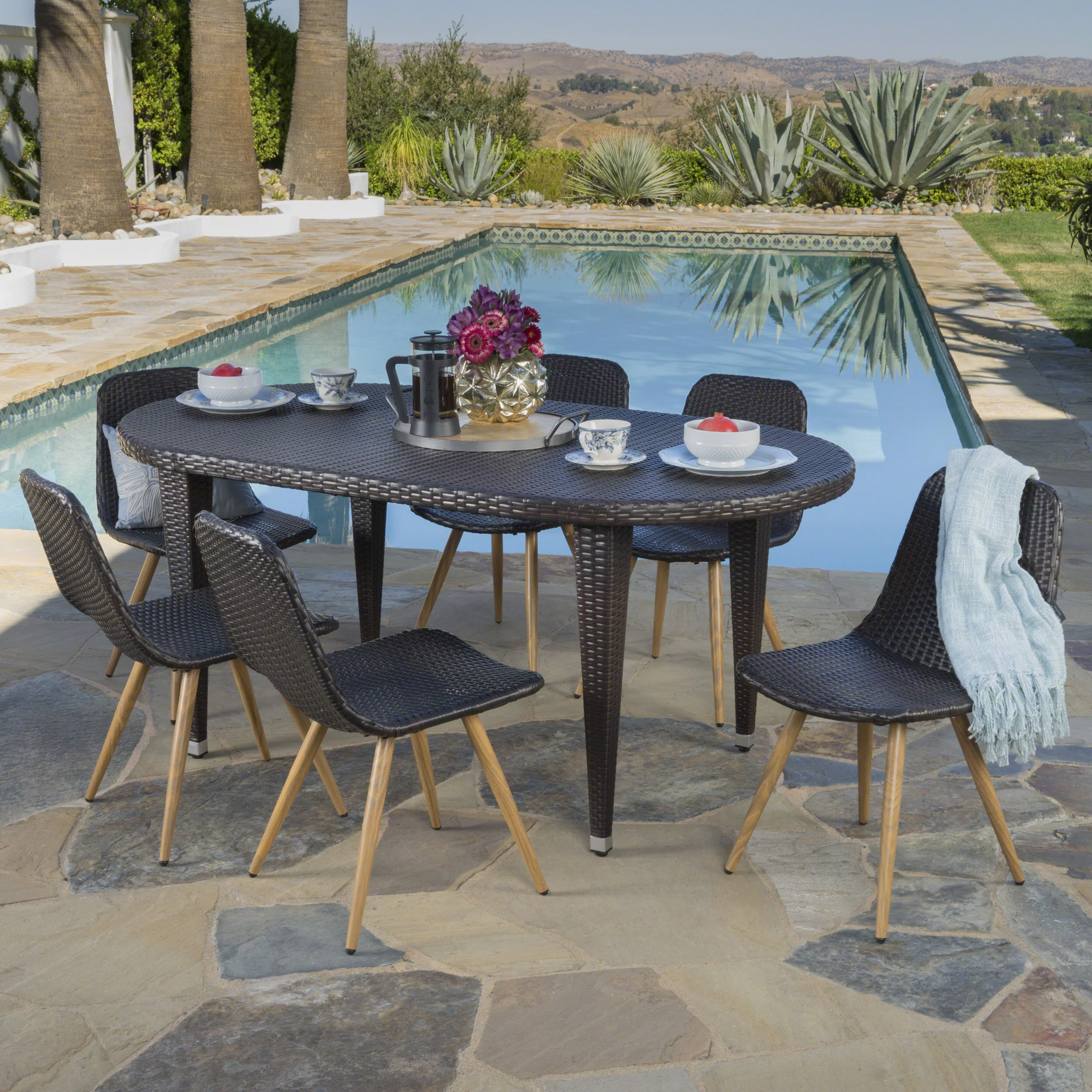 Lynda Outdoor 7 Piece Wicker Oval Dining Set with Wood Finished Legs - furnishings