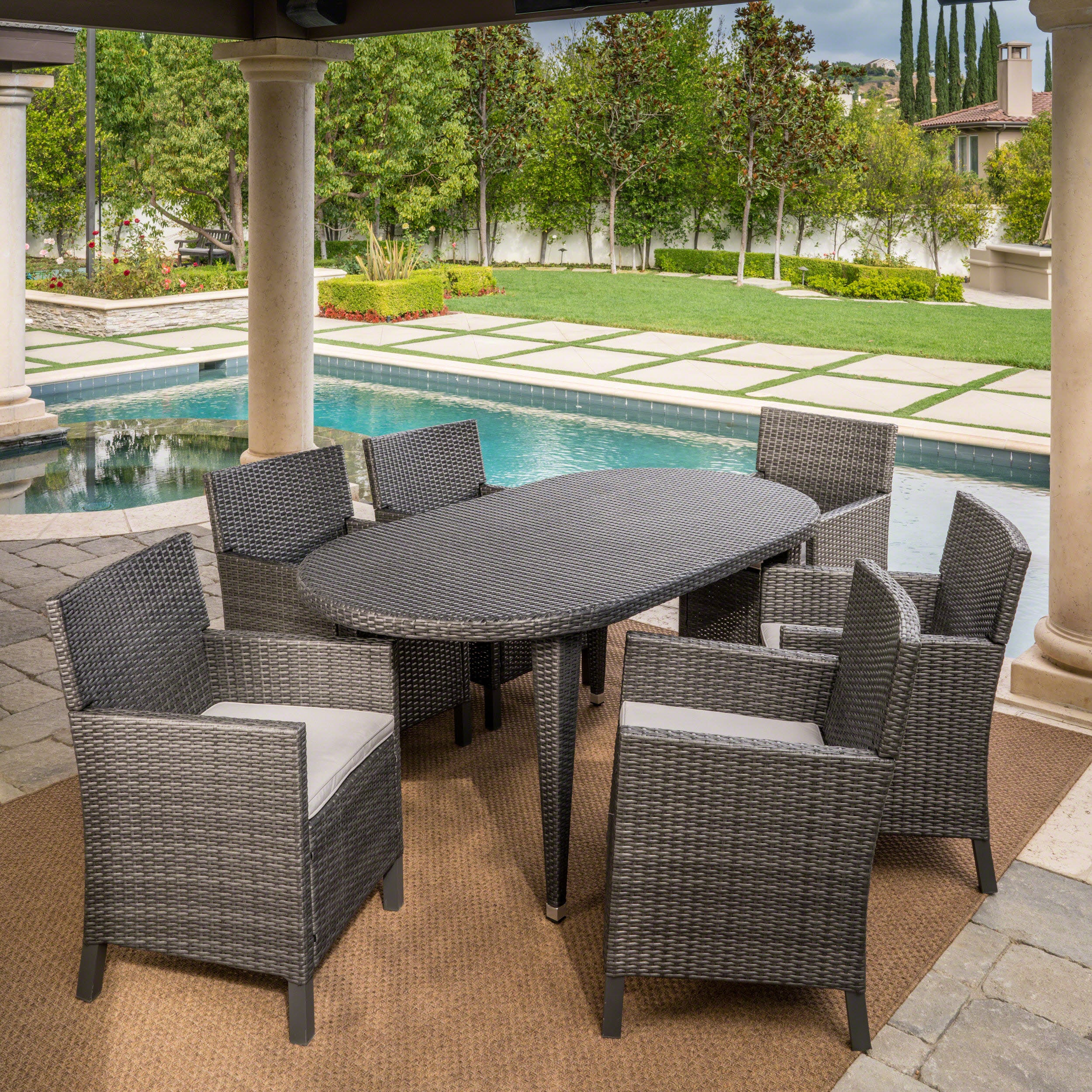 Crete Outdoor 7 Piece Wicker Oval Dining Set with Water Resistant Cushions - furnishings