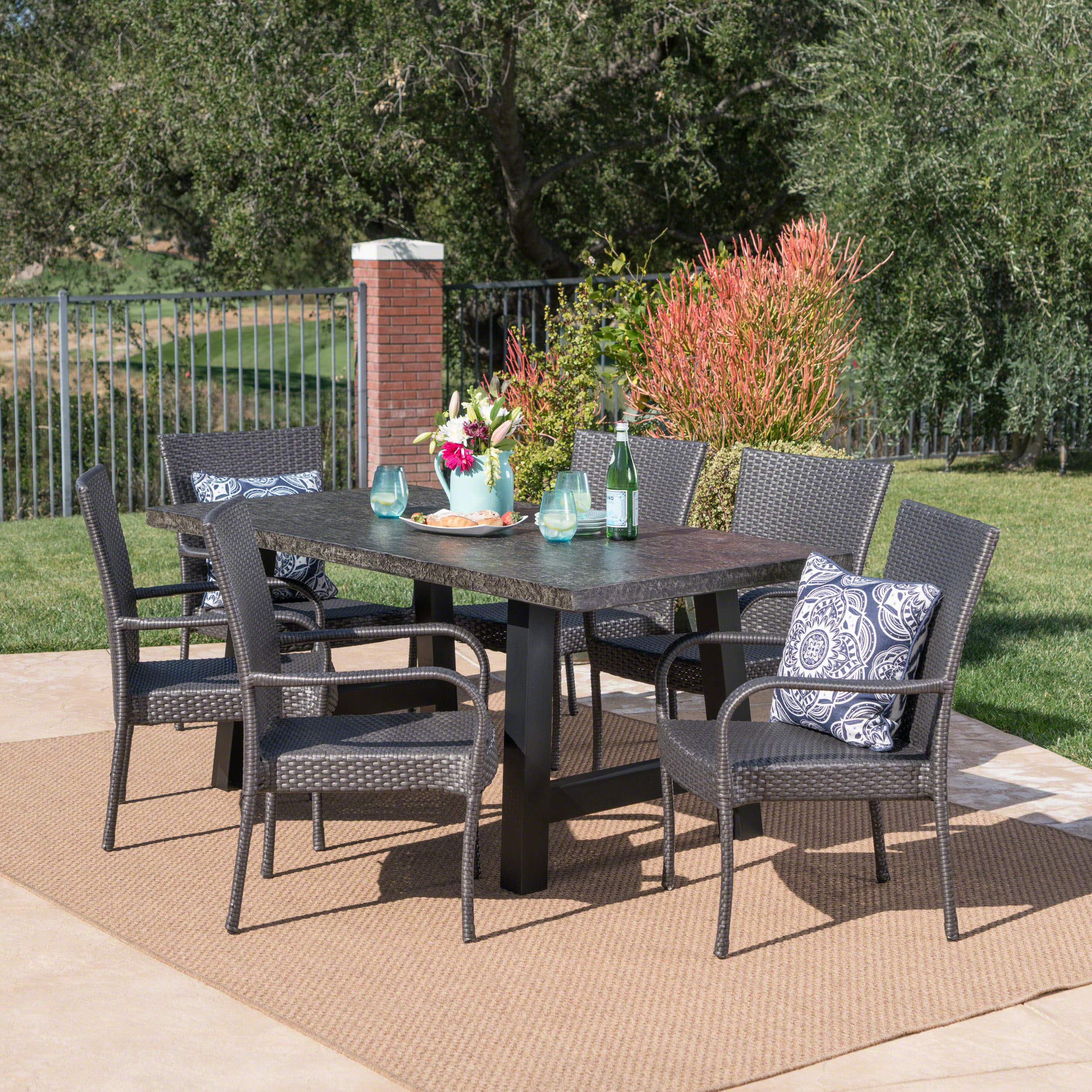 Blease Outdoor 7 Piece Stacking Gray Wicker and Concrete Dining Set - furnishings