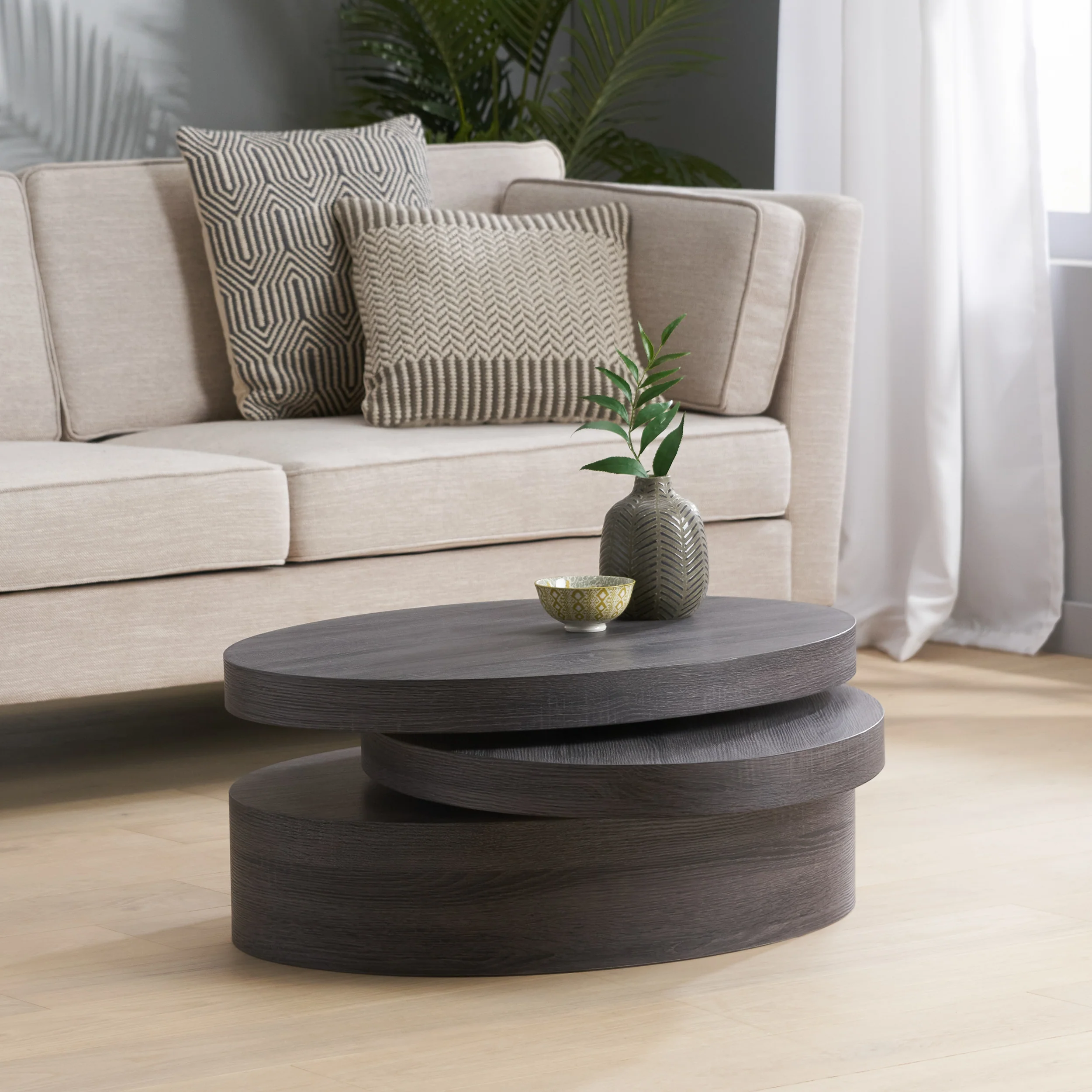 Lenox Modern Oval Black Oak Finish Faux Wood Rotating Coffee Table - furnishings