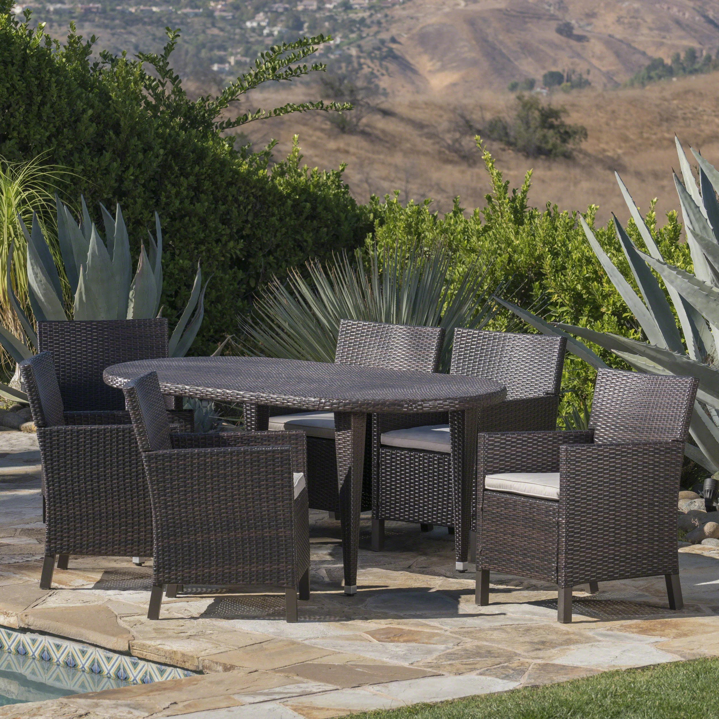 Crete Outdoor 7 Piece Wicker Oval Dining Set with Water Resistant Cushions - furnishings