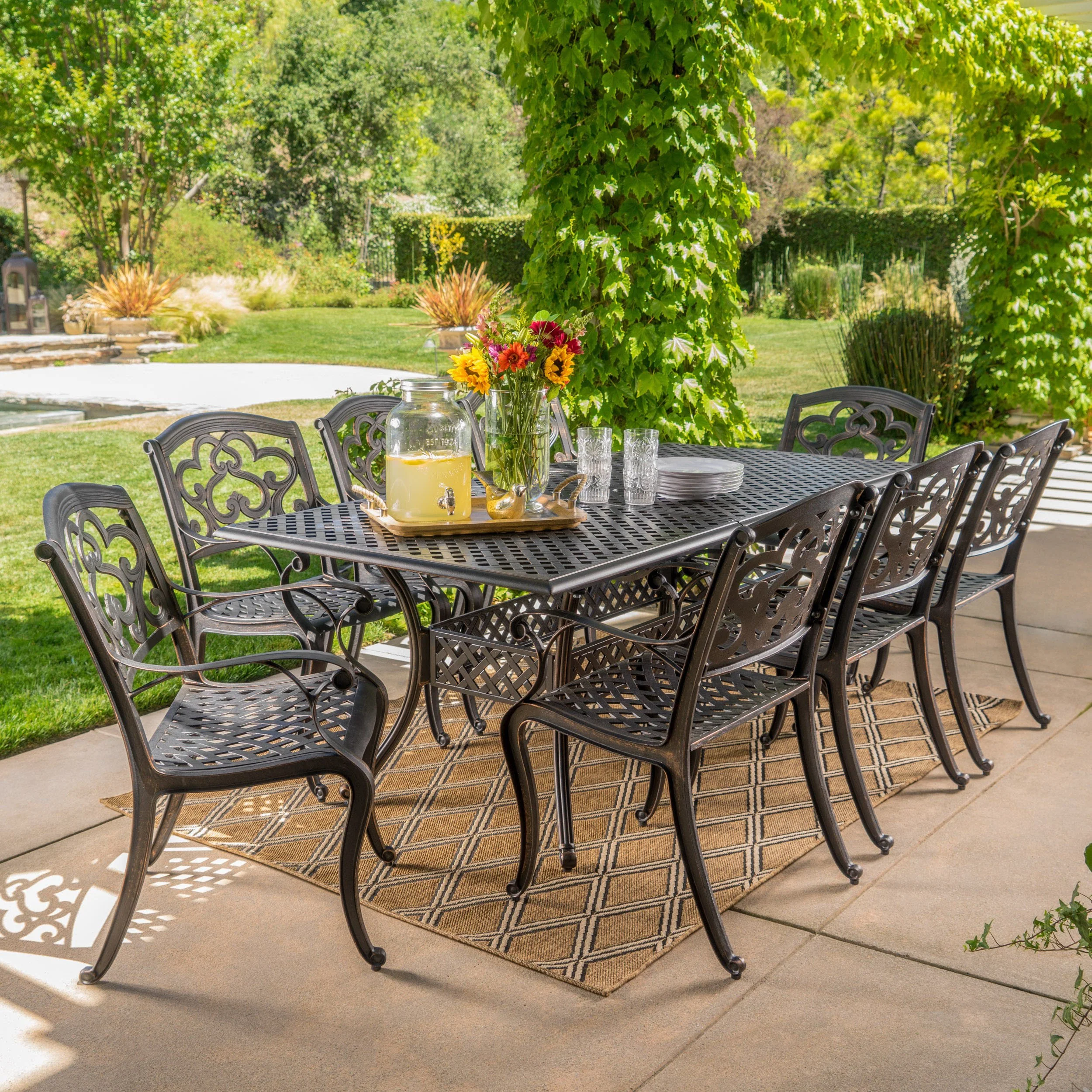 Ariel Outdoor 9 Piece Patina Copper Finish Cast Aluminum Dining Set - furnishings