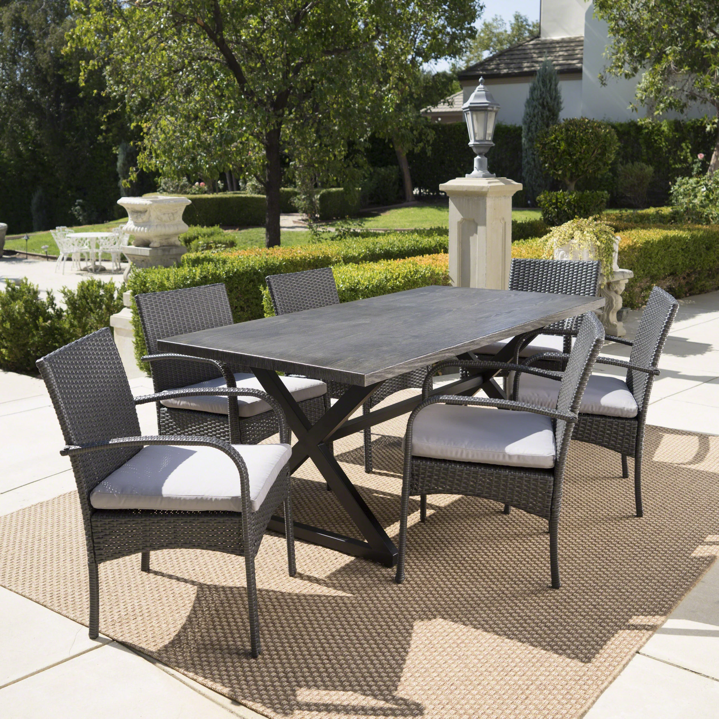Ashley Outdoor 7 Piece Aluminum Dining Set with Wicker Dining Chairs - furnishings