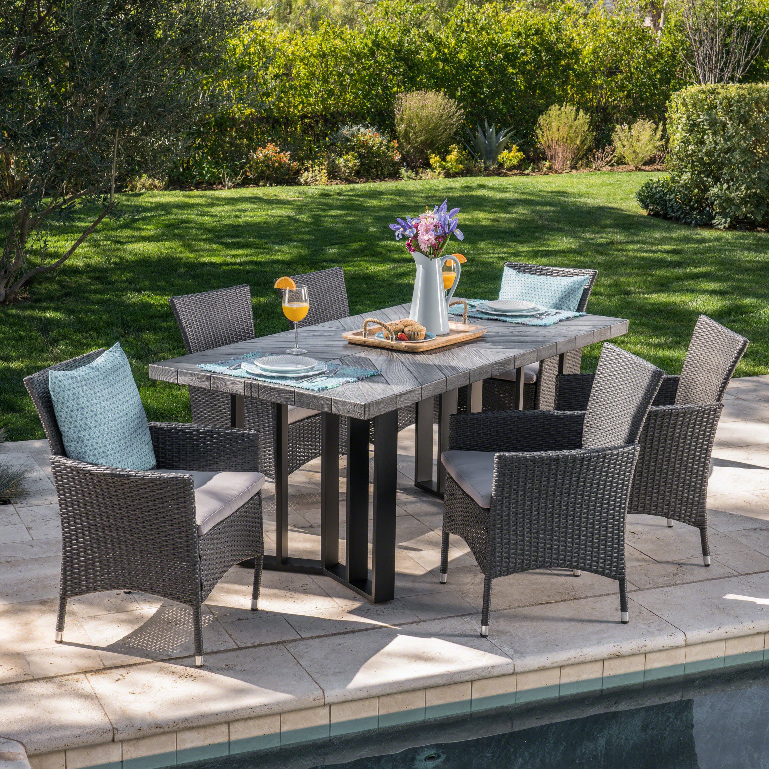 Truda Outdoor 7 Piece Wicker Dining Set with Concrete Dining Table - furnishings
