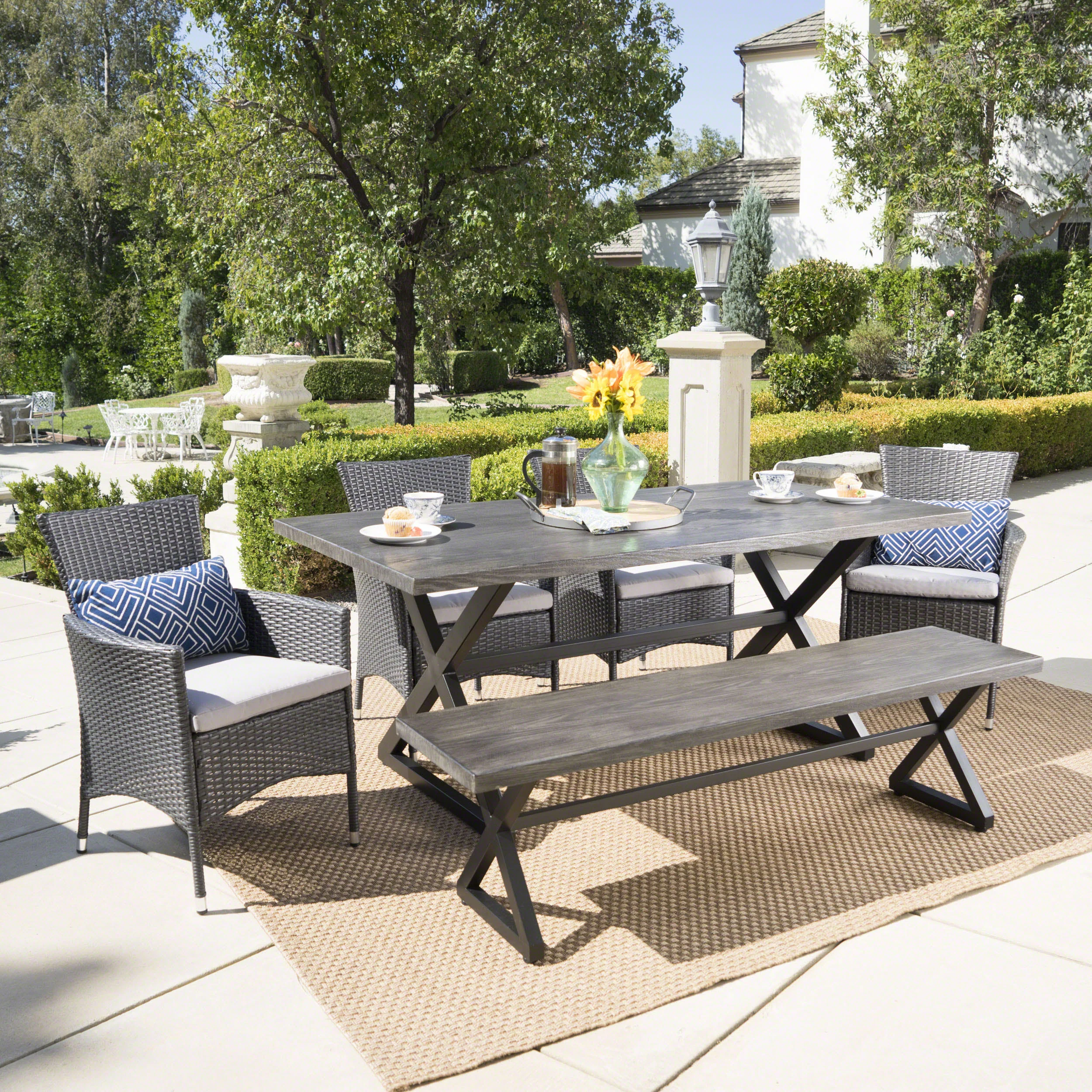 Owenburg Outdoor 6 Piece Aluminum Dining Set with Bench and Wicker Dining Chairs - furnishings