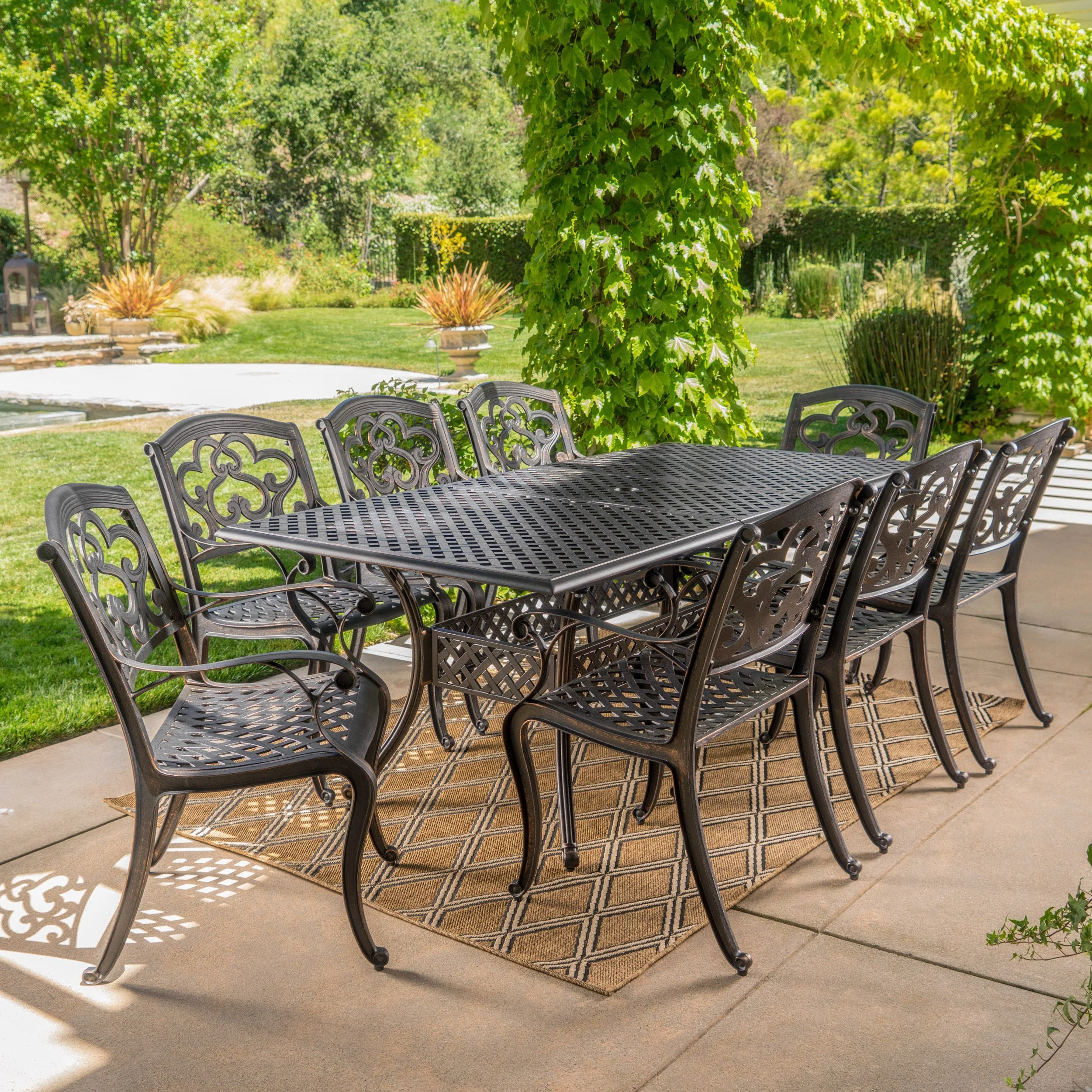 Ariel Outdoor 9 Piece Patina Copper Finish Cast Aluminum Dining Set - furnishings