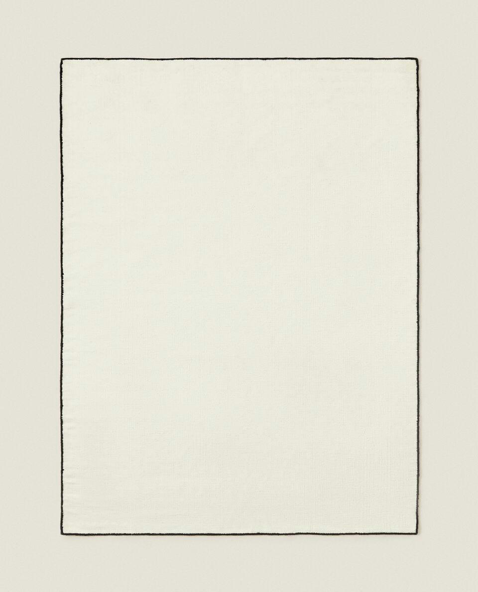 WOOL OVERLOCK RUG