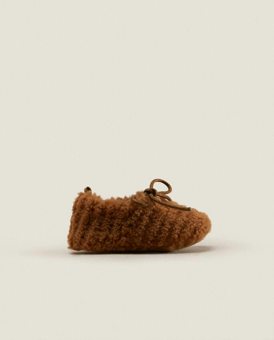 FAUX SHEARLING BOOTIES WITH BOW