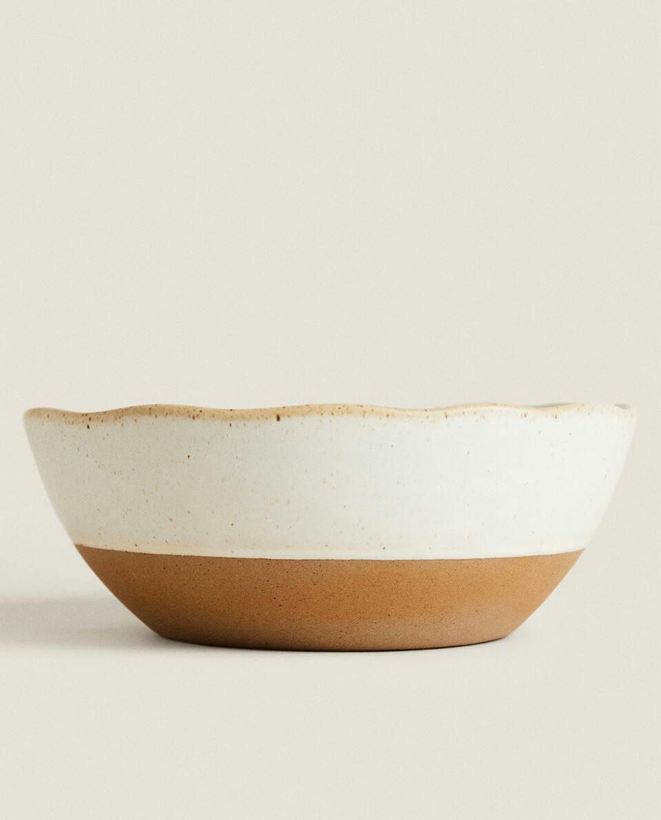 STONEWARE SET WITH RAISED DESIGN